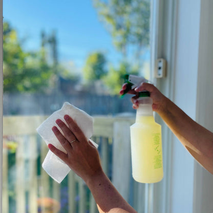 Washing window using a spray bottle that includes the olive oil soap granules